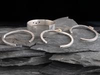 Four Sterling Silver Cuff Bracelets, Three with 14K Gold Accents