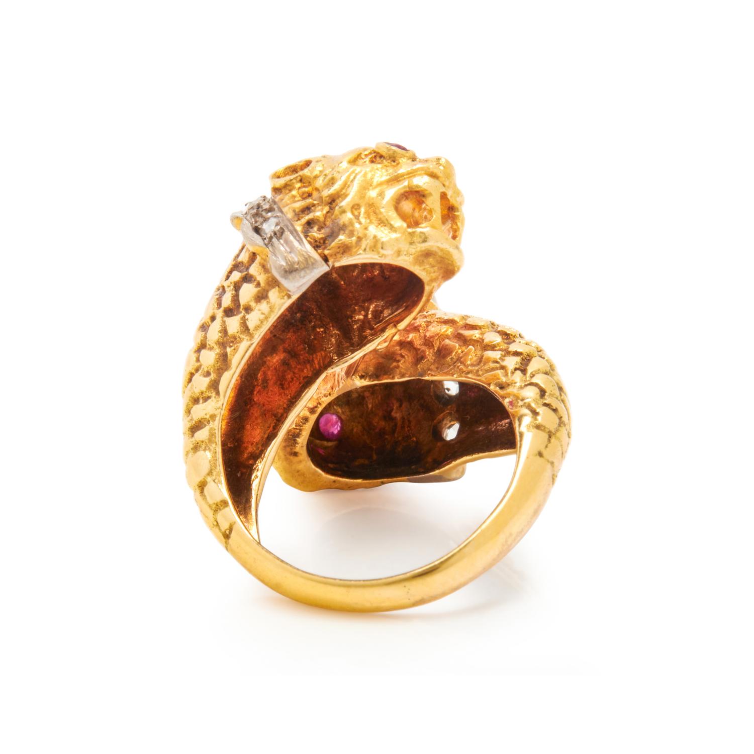 LALAOUNIS, YELLOW GOLD, RUBY, AND DIAMOND LION'S HEAD BYPASS RING