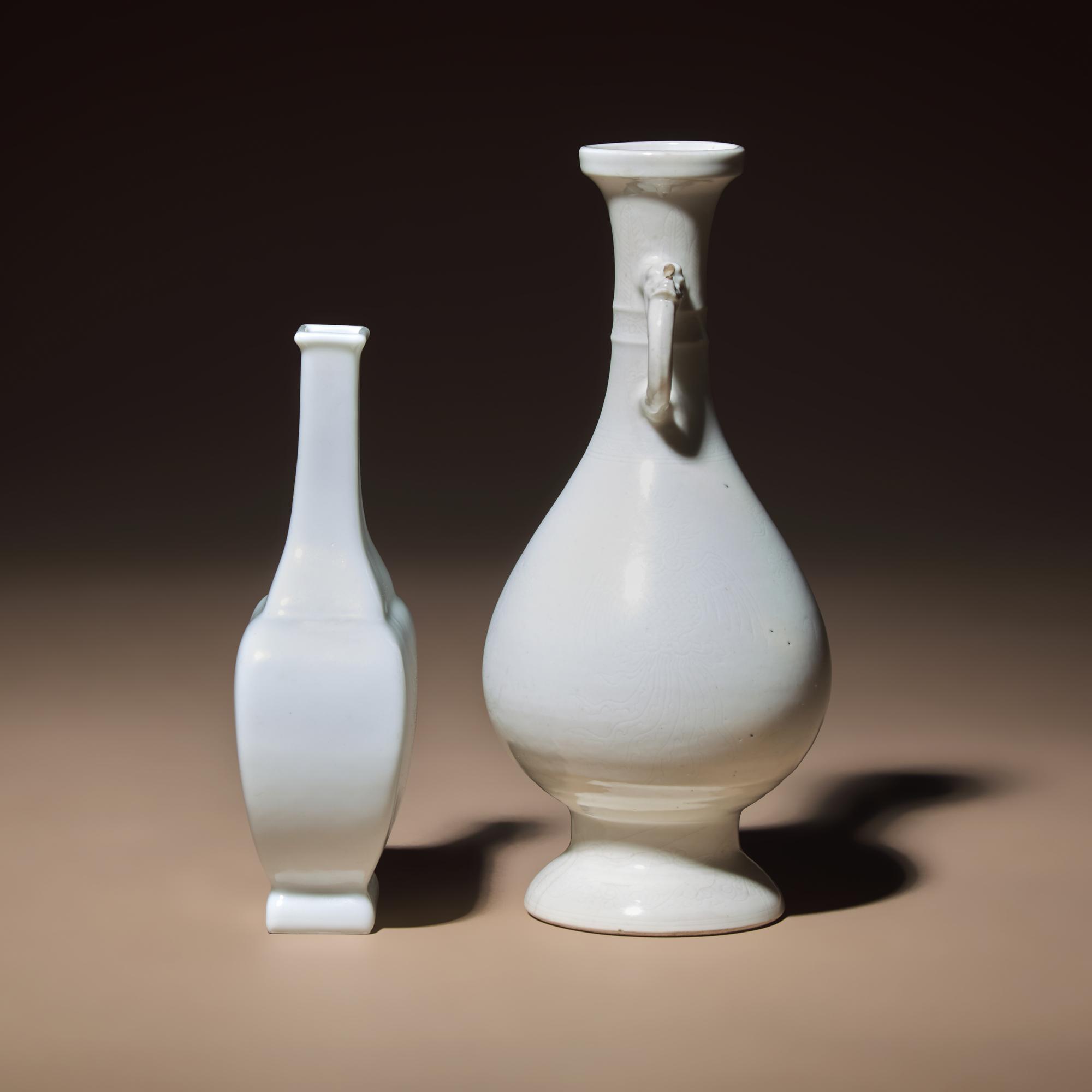 Two Chinese White Glazed Porcelain Vases, Qing Dynasty — 清 雙龍耳暗刻龍鳳紋白釉瓶及白釉四方小瓶