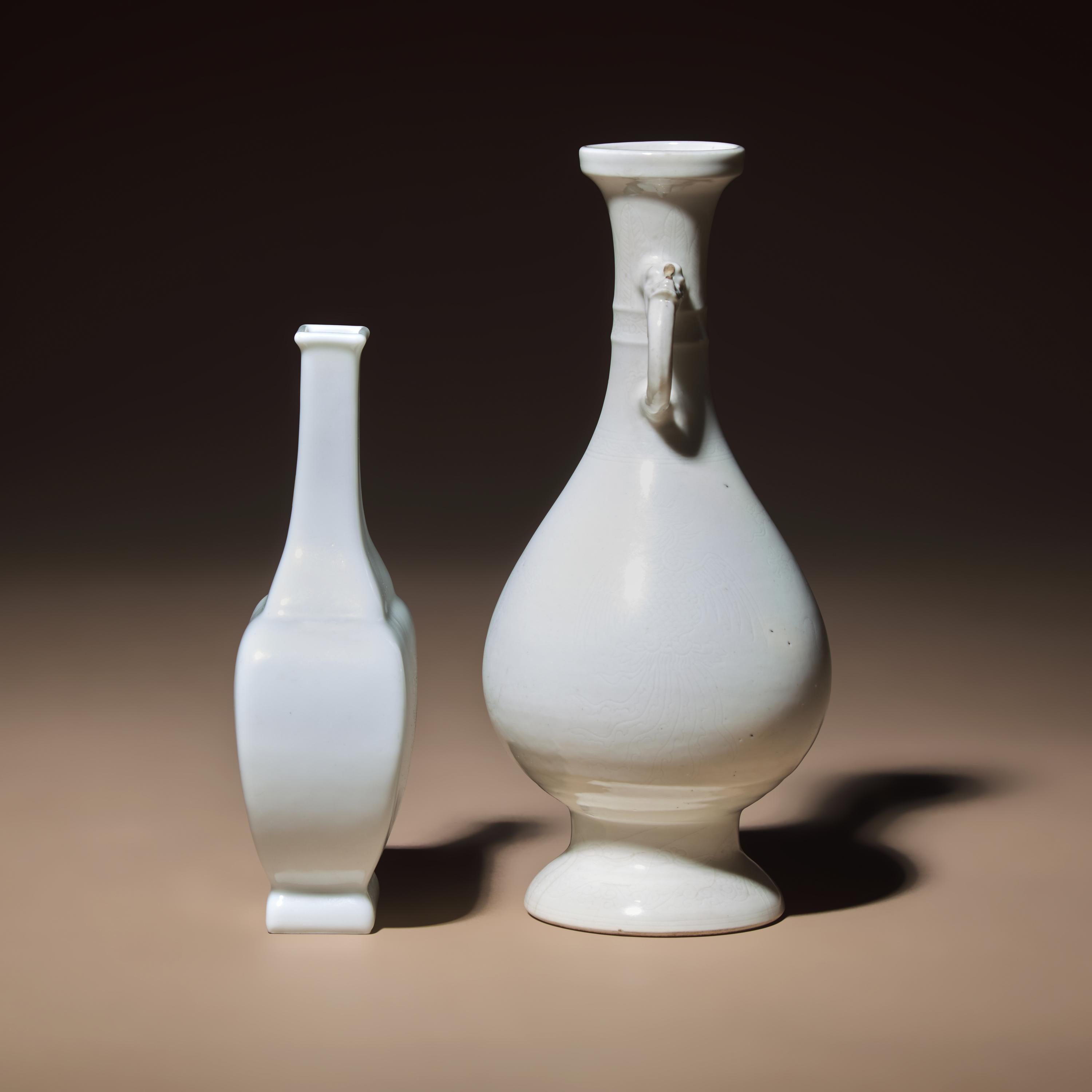 Two Chinese White Glazed Porcelain Vases, Qing Dynasty — 清 雙龍耳暗刻龍鳳紋白釉瓶及白釉四方小瓶