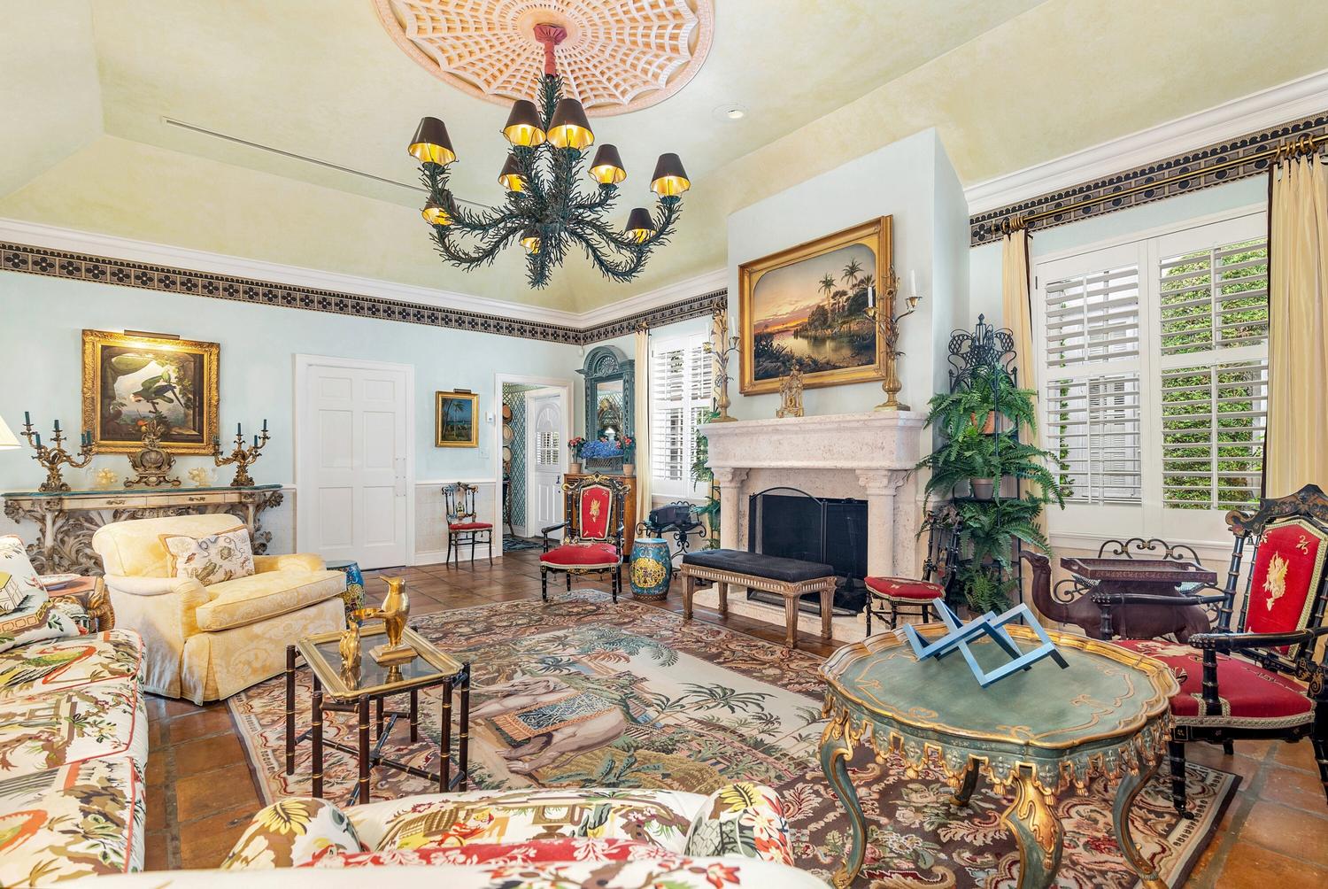 A French Gilt Metal-Mounted Painted and Parcel Gilt Commode