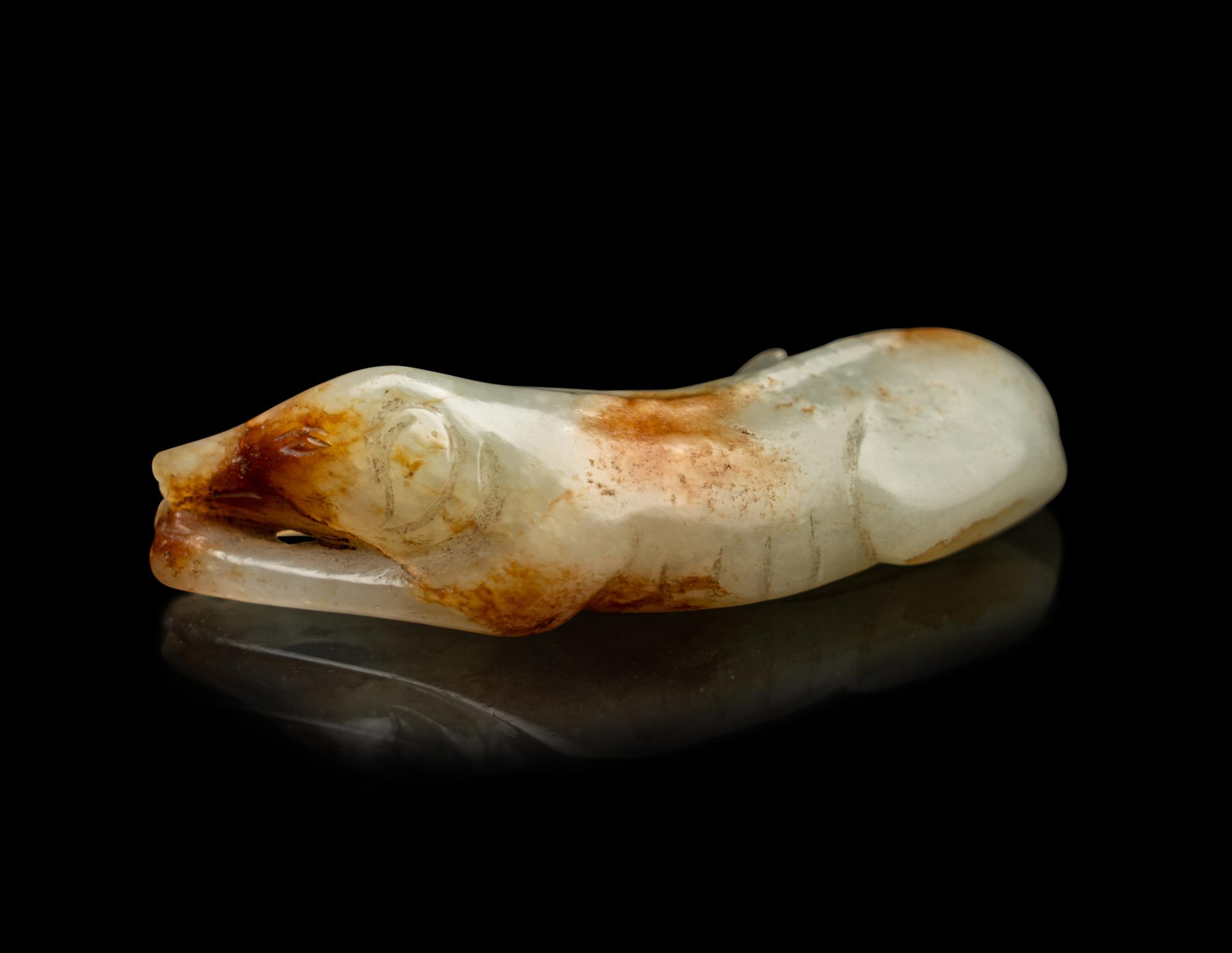 A Chinese Russet and Pale Celadon Green Jade Figure of a Hound