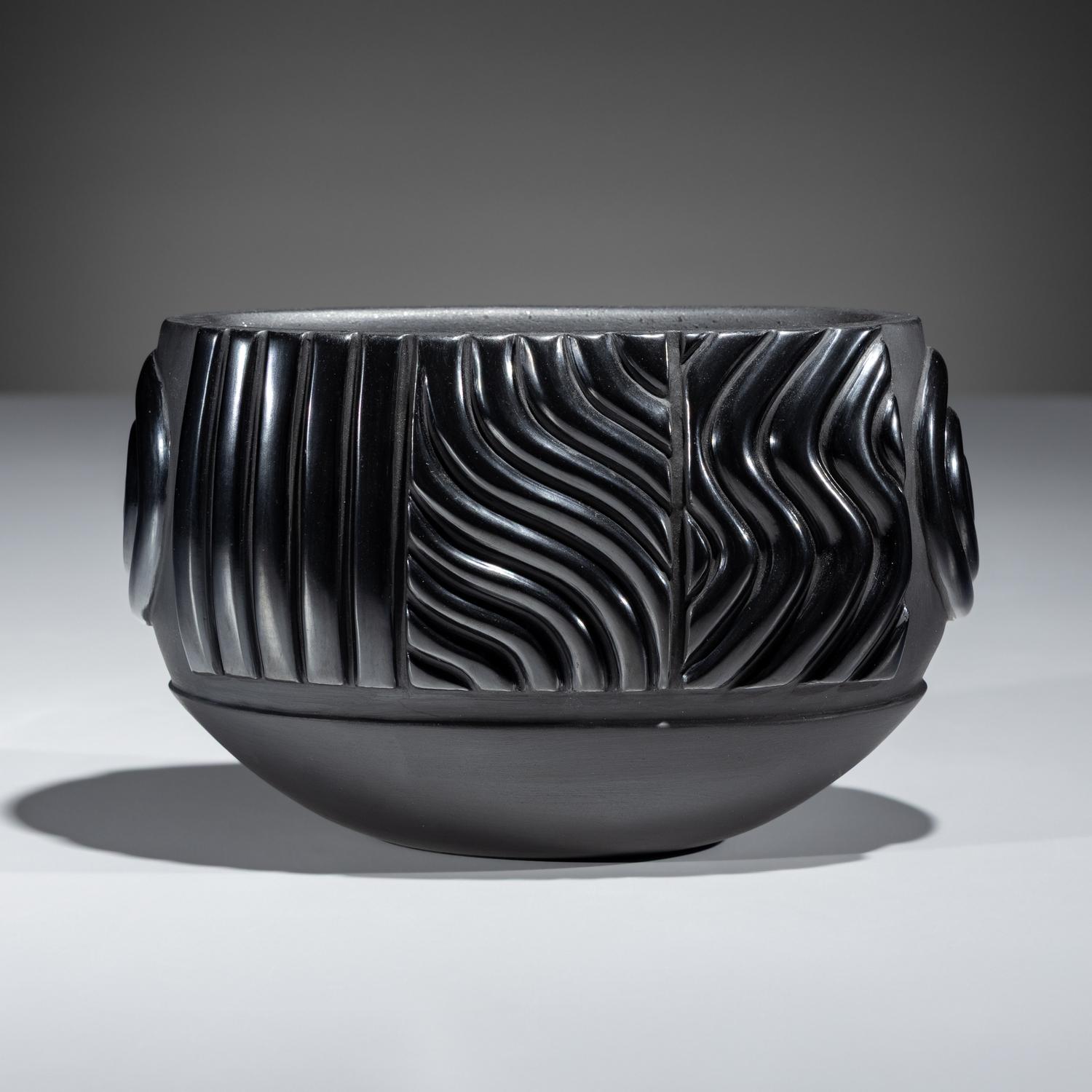 Carved Blackware Jar, with Micaceous Interior