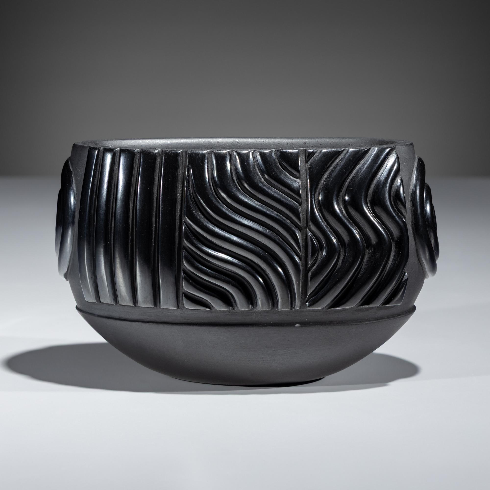 Carved Blackware Jar, with Micaceous Interior