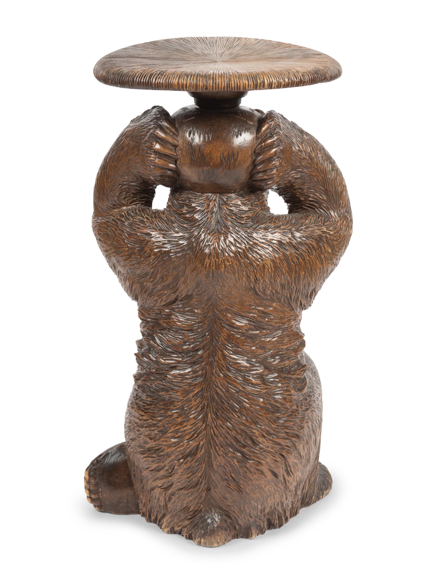 A Black Forest Carved Figural Stool