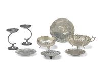A Group of Eight Persian Silver Table Articles