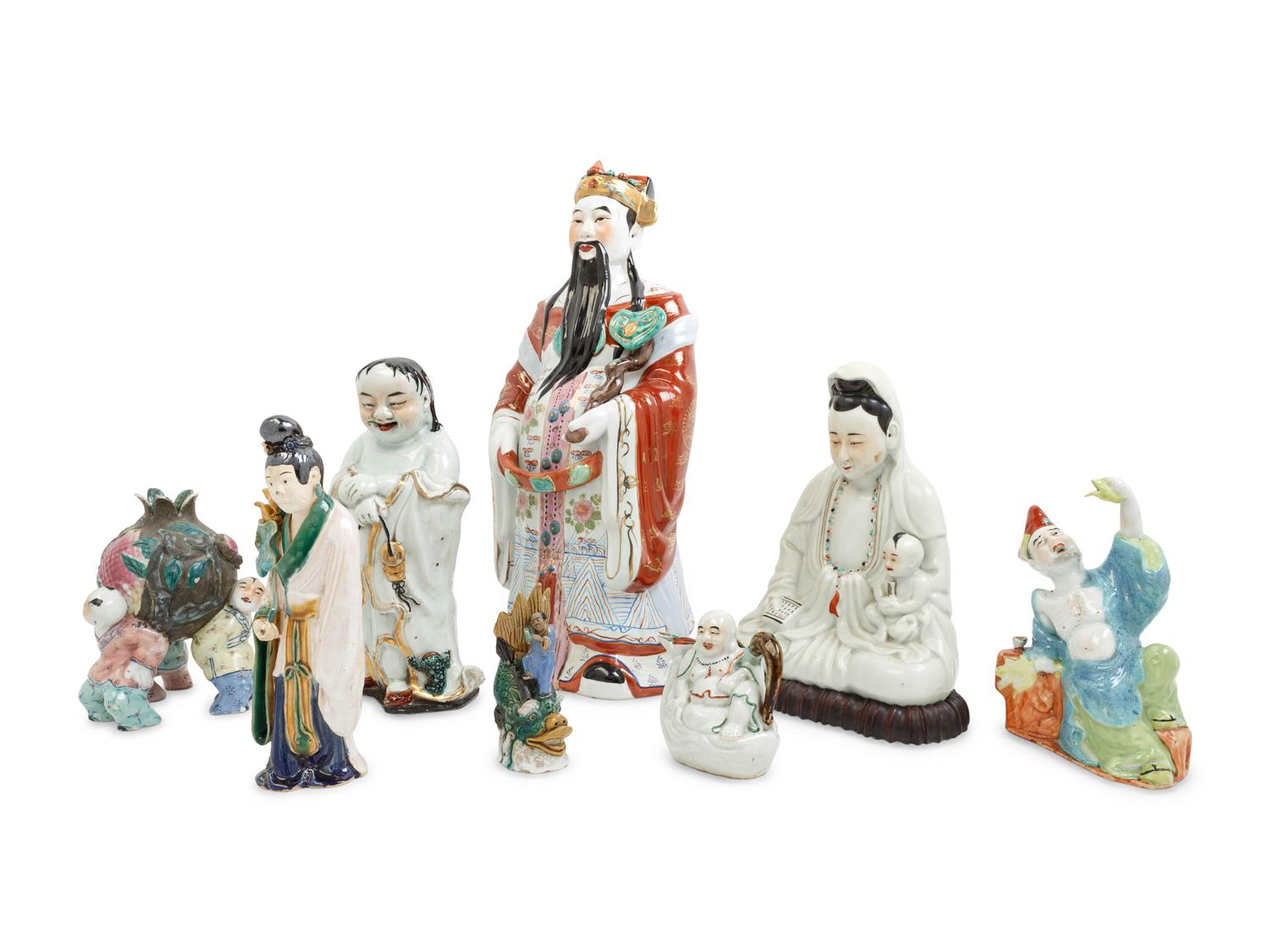 Eight Chinese Famille Rose Porcelain Figures