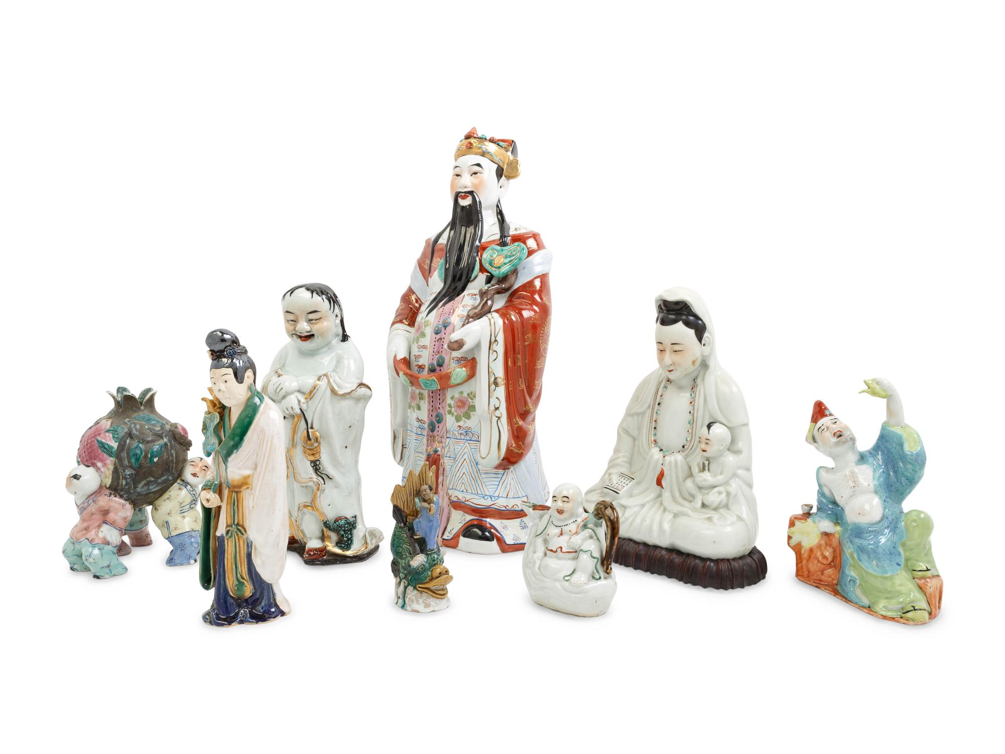 Eight Chinese Famille Rose Porcelain Figures