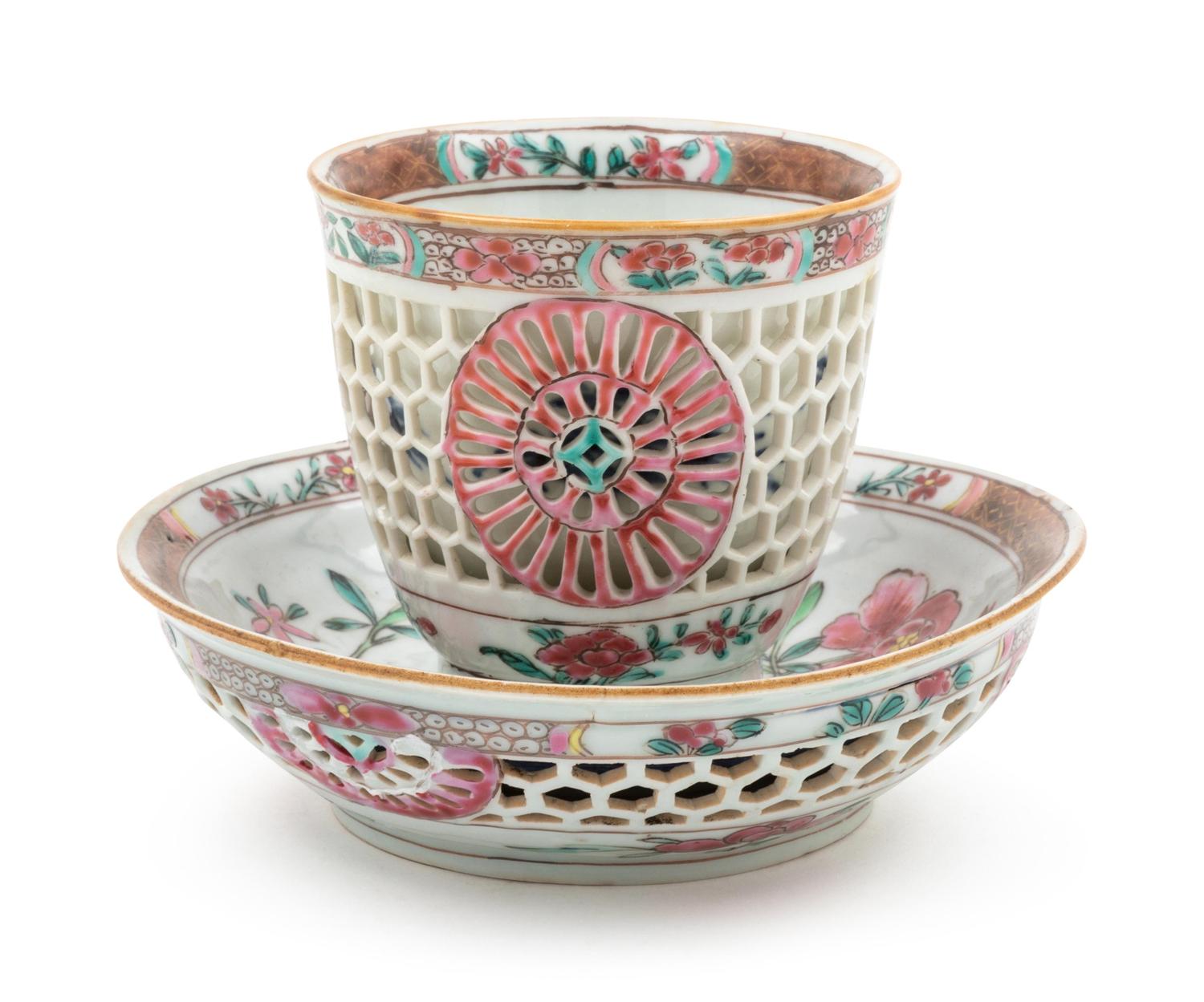 A Chinese Export Famille Rose Reticulated Porcelain Teacup and Saucer