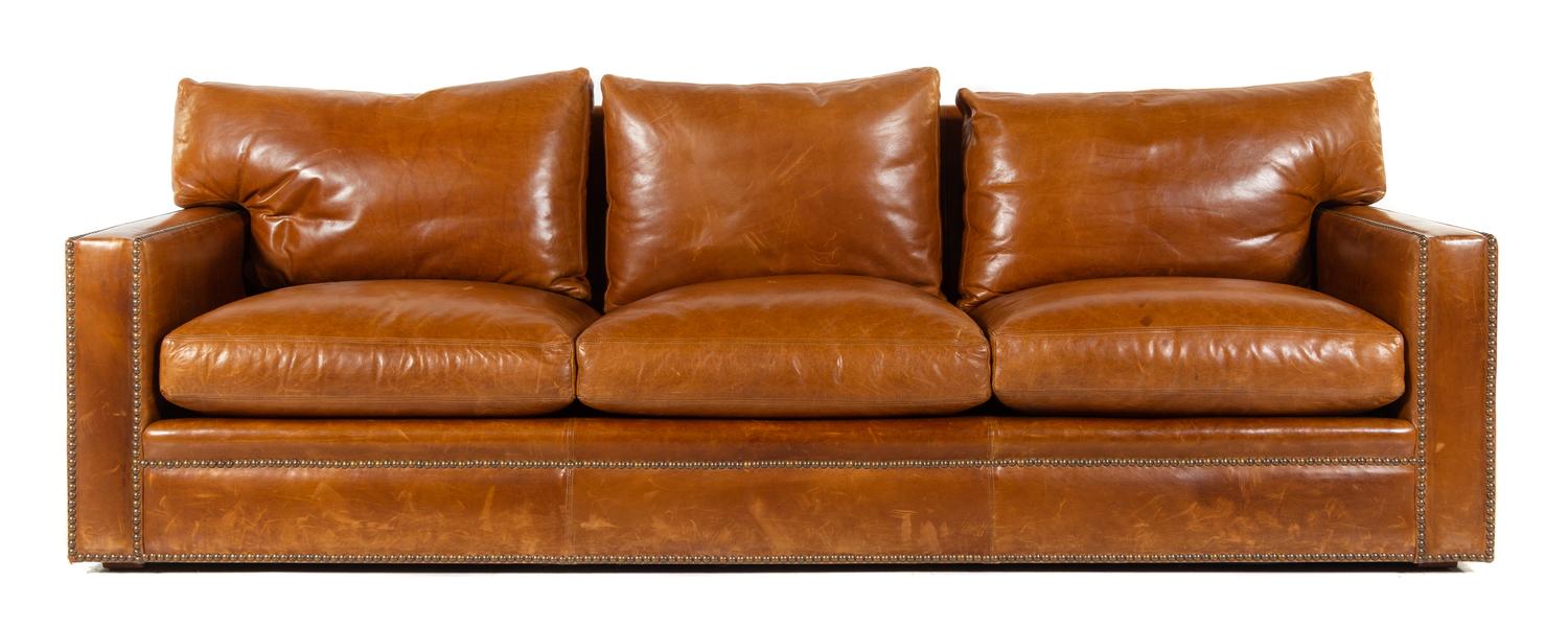 A Custom Leather-Upholstered Three-Seat Sofa Height 35 x width 108 x depth 40 inches. — 20TH CENTURY