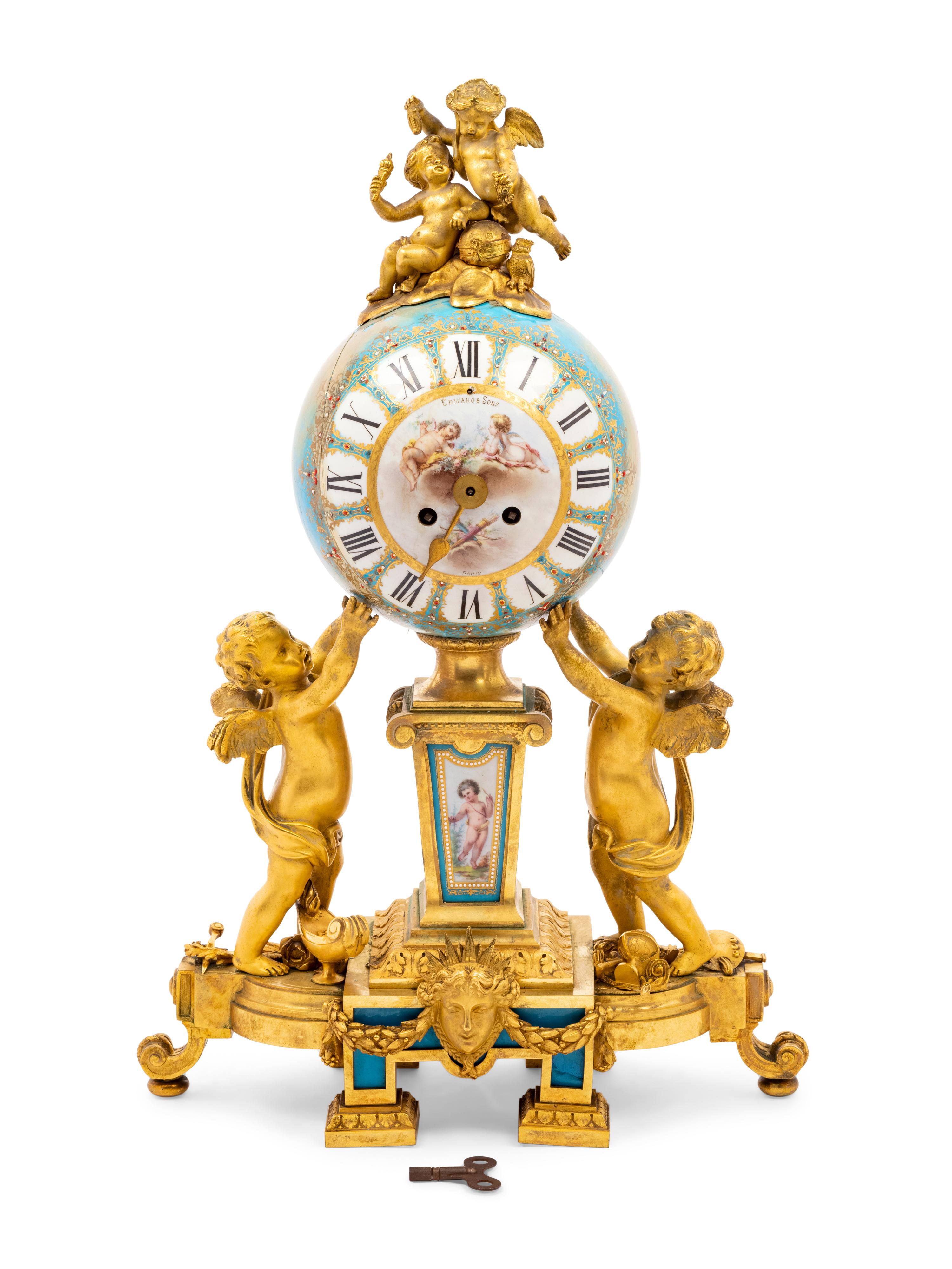A Sèvres Style Porcelain and Gilt Bronze Mounted Three-Piece Clock Garniture