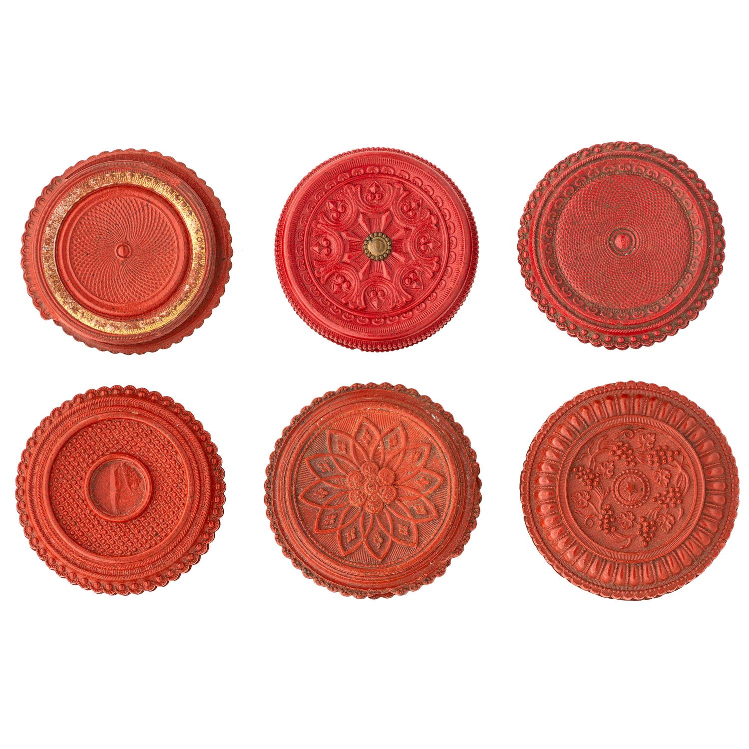 [EARLY PHOTOGRAPHY - UNION CASES]. A group of 6 assorted red "oreo" union cases, highlighted by very very rare floral example, including: