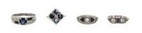 A Collection of 18 Karat White Gold, Diamond, Sapphire and Synthetic Sapphire Rings, 8.40 dwts.