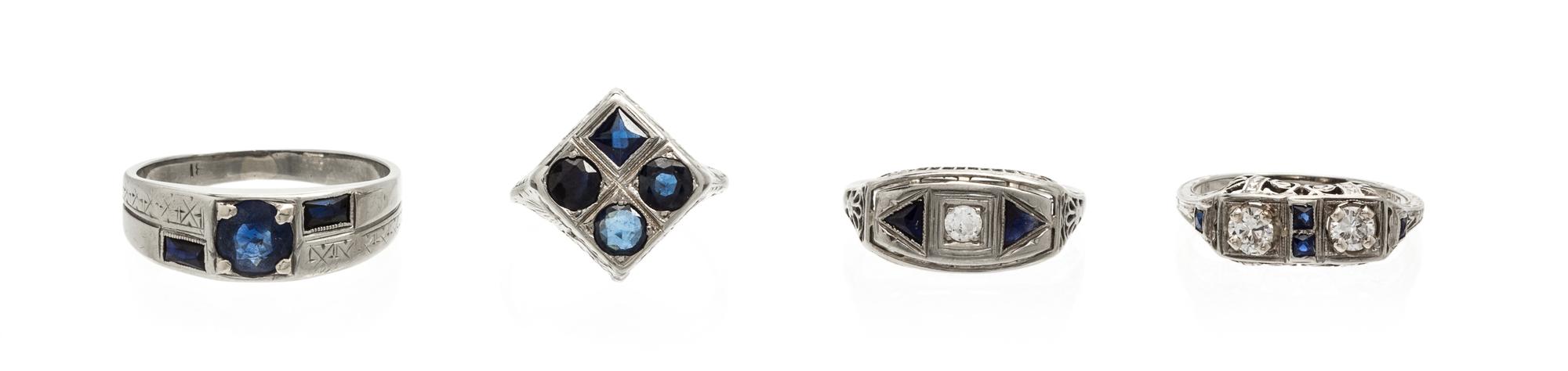A Collection of 18 Karat White Gold, Diamond, Sapphire and Synthetic Sapphire Rings, 8.40 dwts.