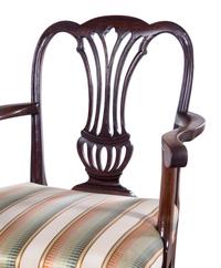 A Pair of George III Carved Mahogany Armchairs