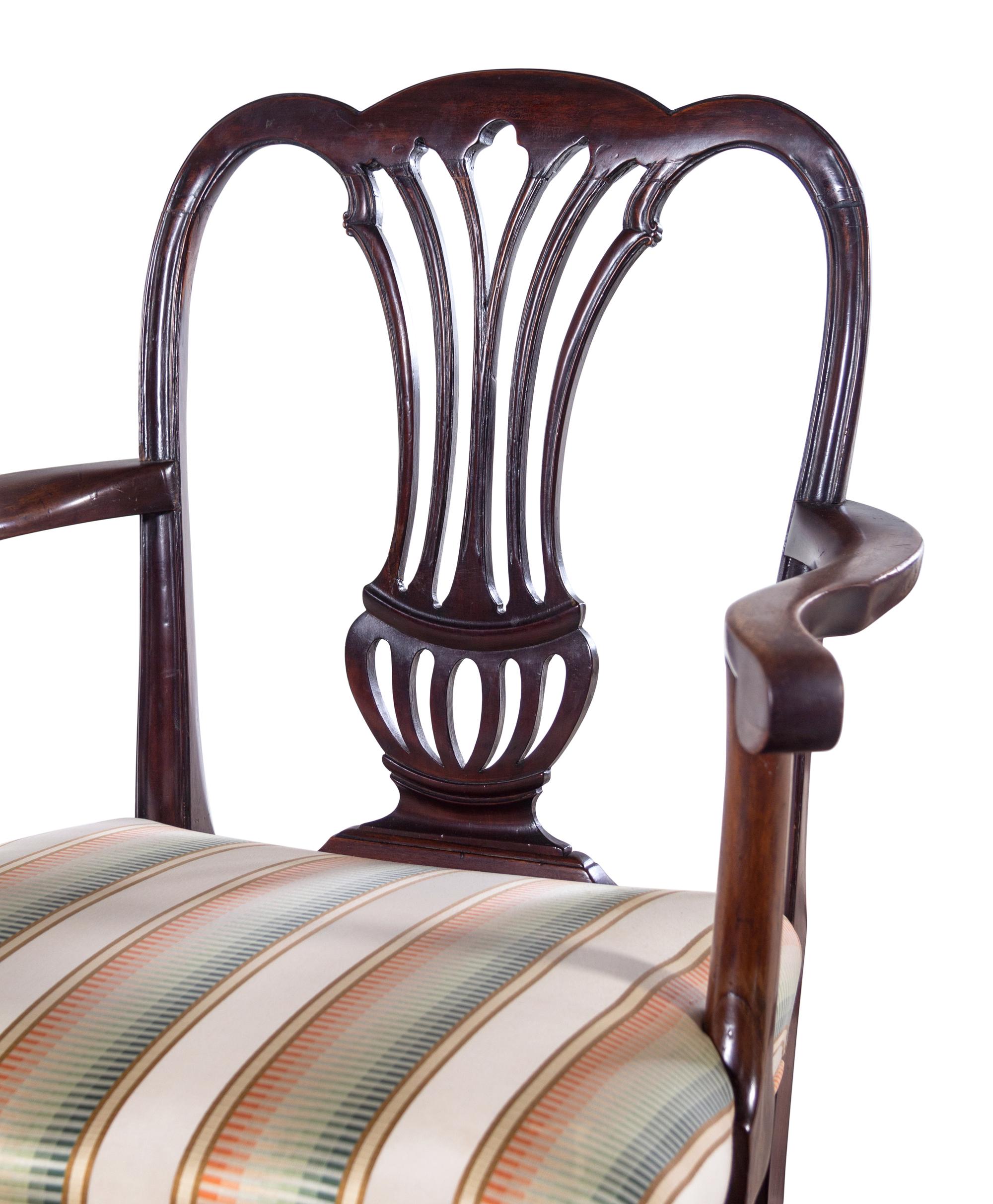 A Pair of George III Carved Mahogany Armchairs