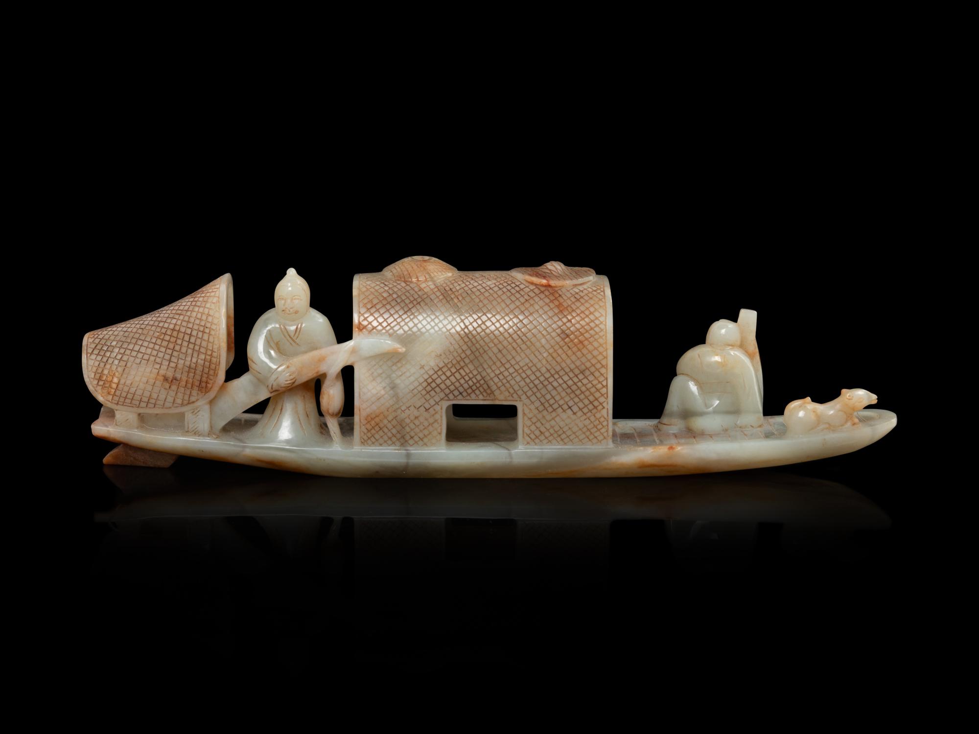 A Chinese Celadon and Russet Jade Boat