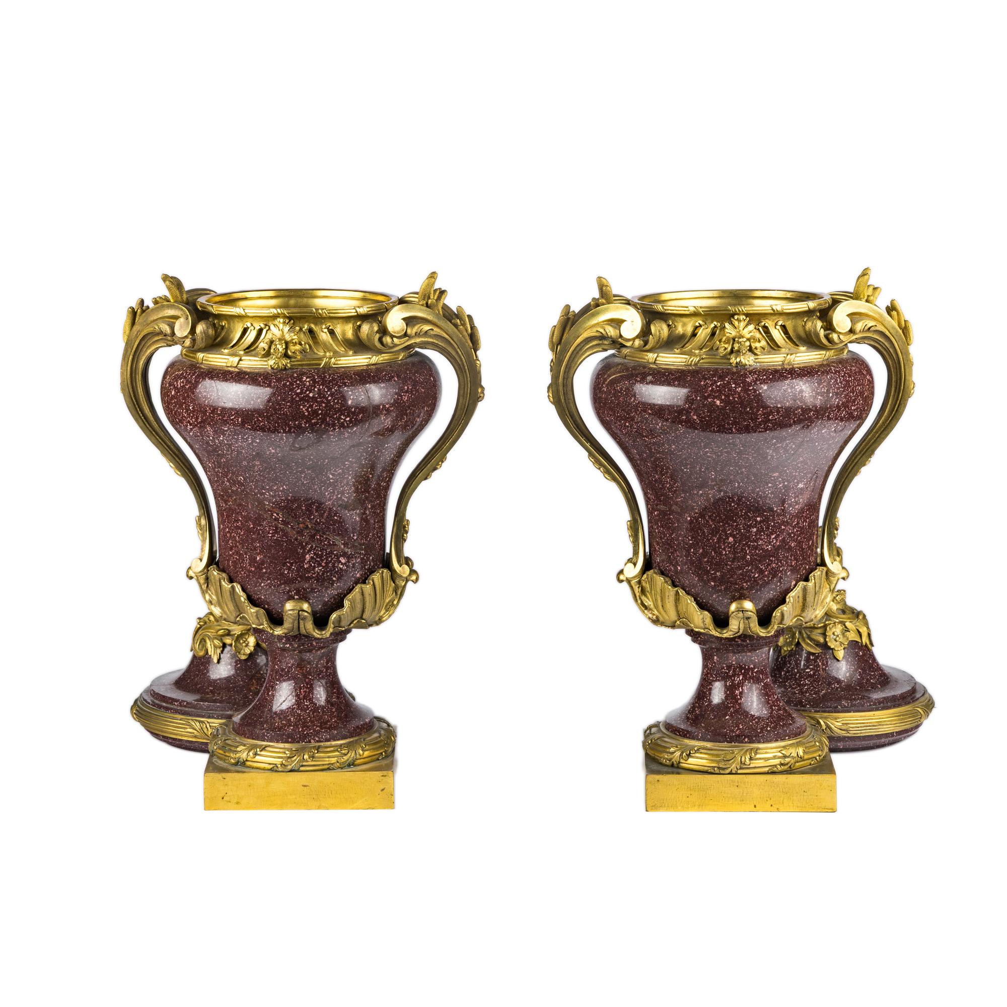 A Pair of Gilt Bronze Mounted Porphyry Urns