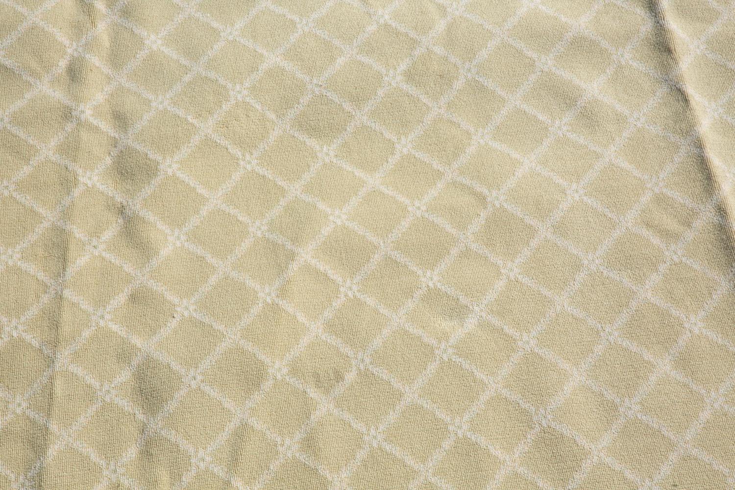 A Green and White Trellis Design Rug by Stark — 20TH CENTURY
