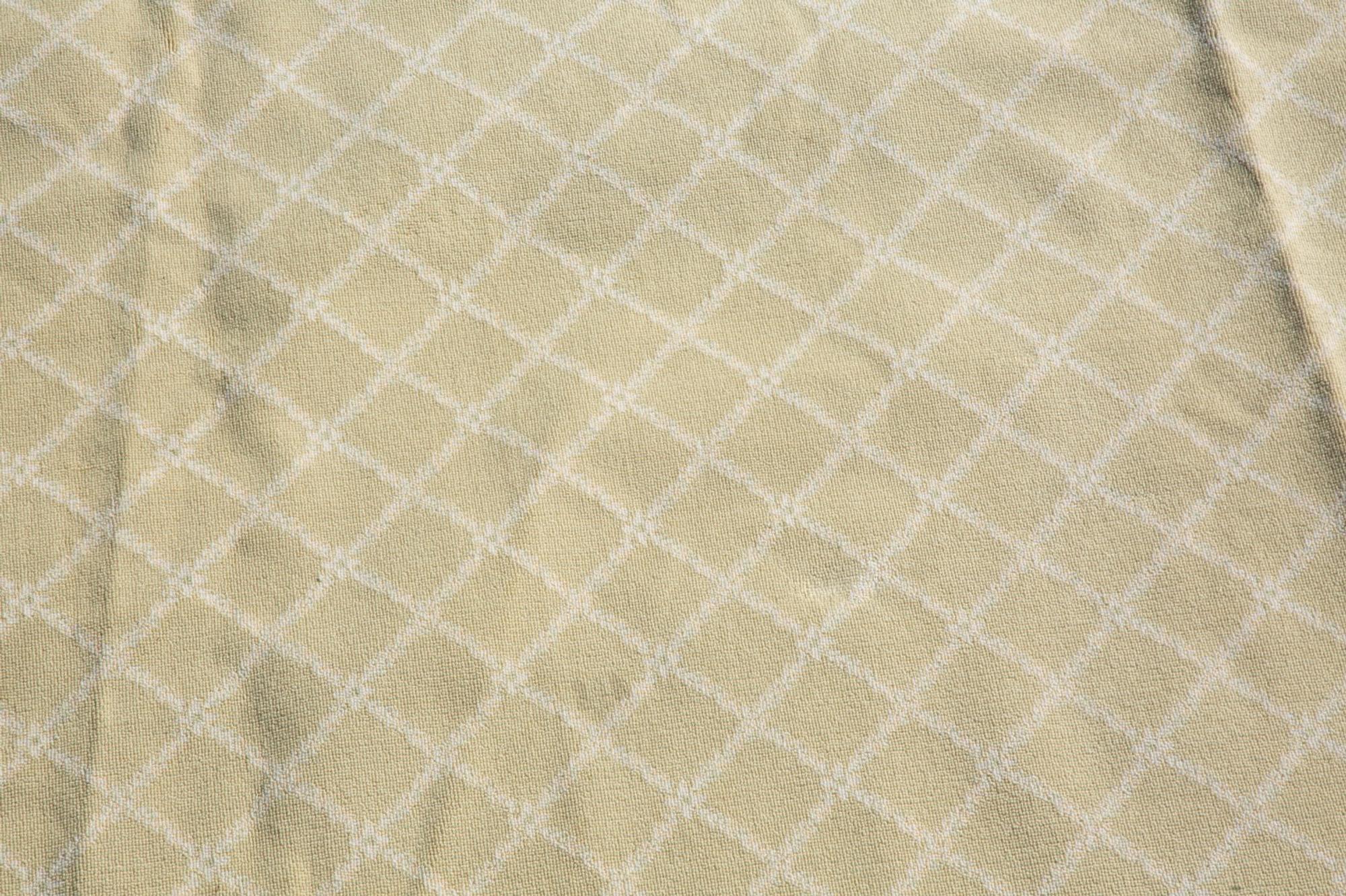A Green and White Trellis Design Rug by Stark — 20TH CENTURY