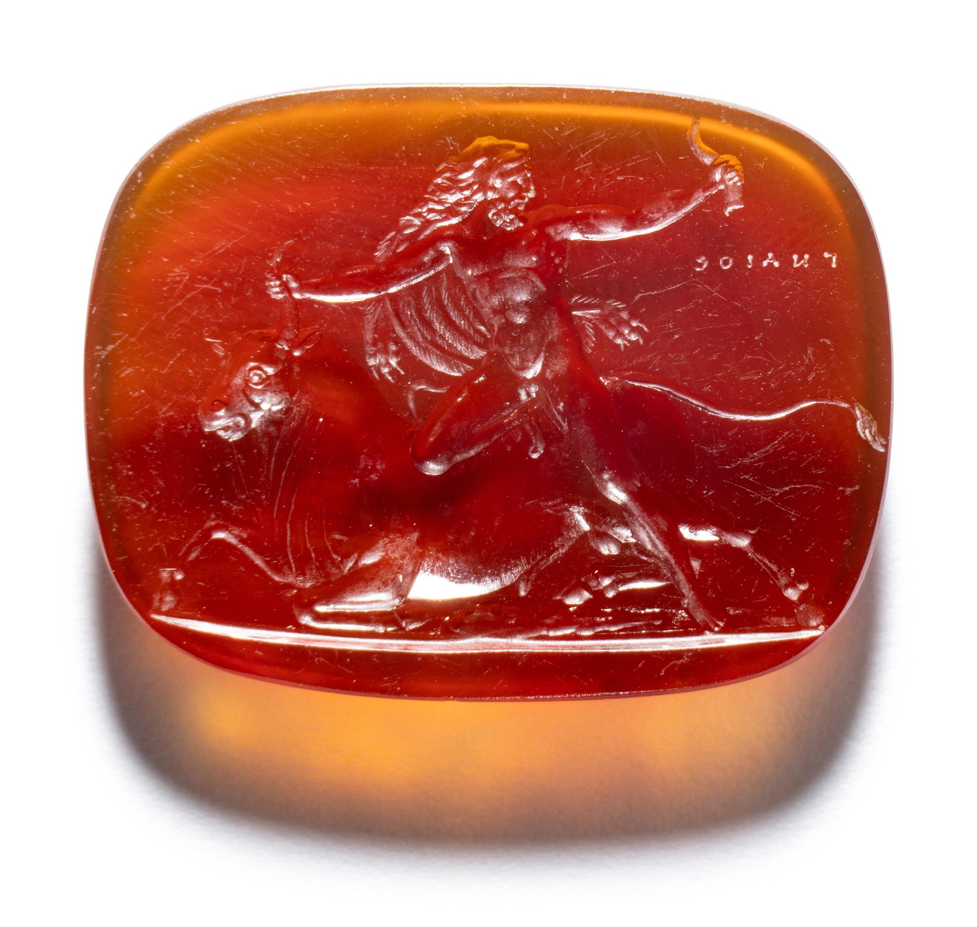 A Neoclassical Carnelian Intaglio with Hercules Battling Achelous