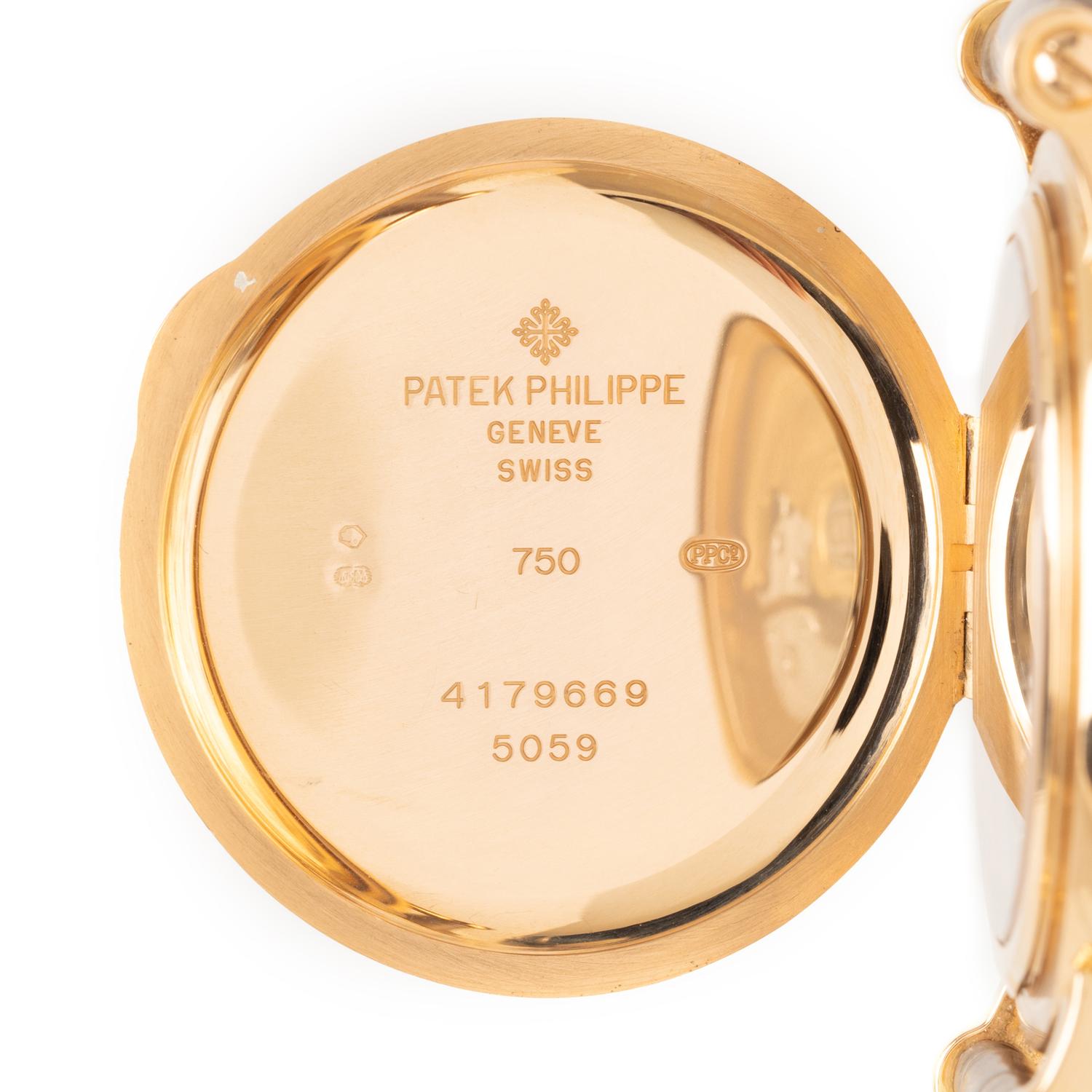 PATEK PHILIPPE, REF. 5059R 18K ROSE GOLD OFFICER'S CASE PERPETUAL CALENDAR, MOONPHASE WATCH, BOX & PAPERS