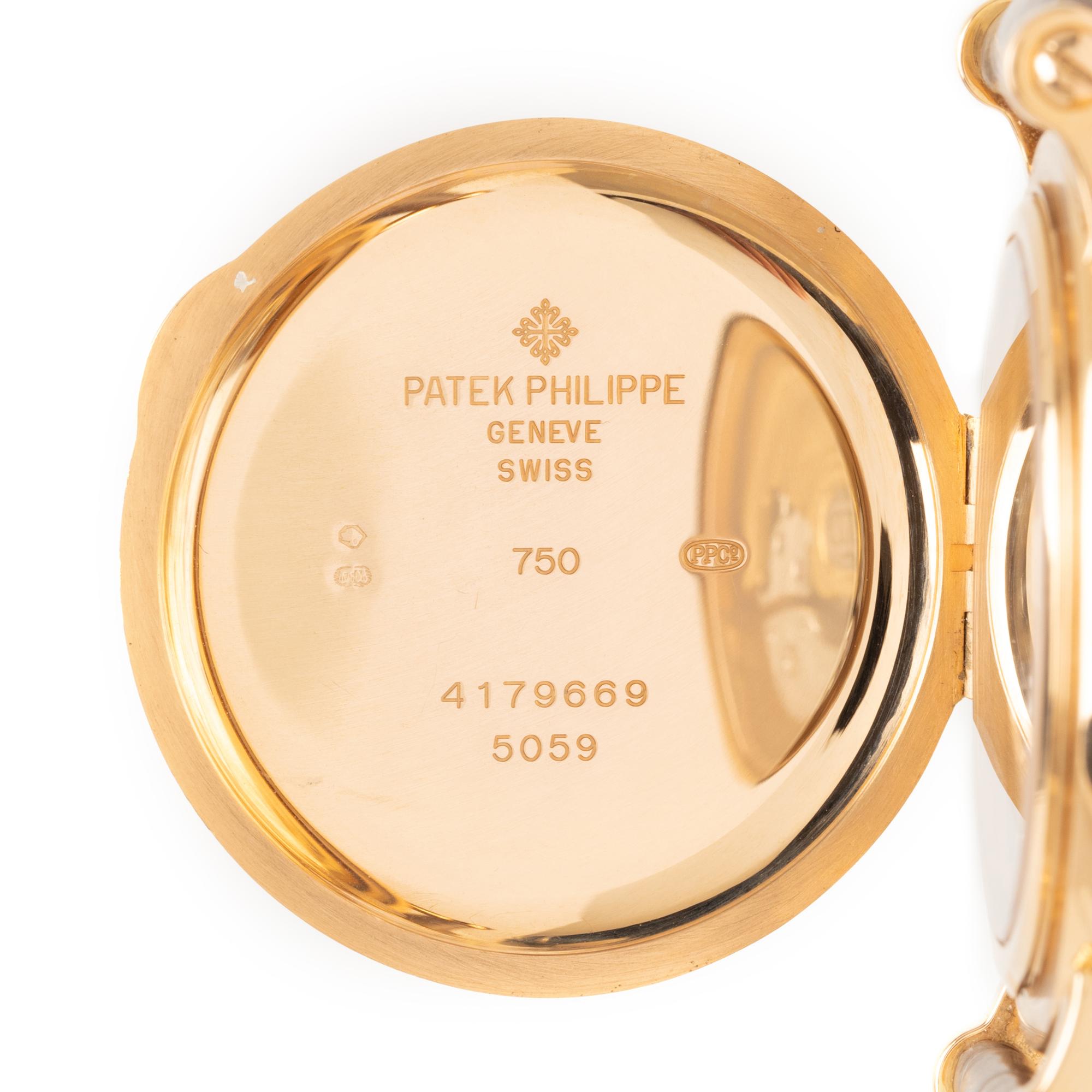 PATEK PHILIPPE, REF. 5059R 18K ROSE GOLD OFFICER'S CASE PERPETUAL CALENDAR, MOONPHASE WATCH, BOX & PAPERS
