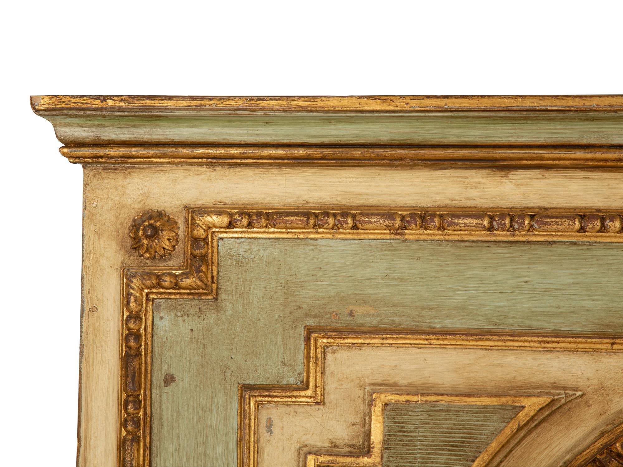A French Painted and Parcel Gilt Trumeau Mirror