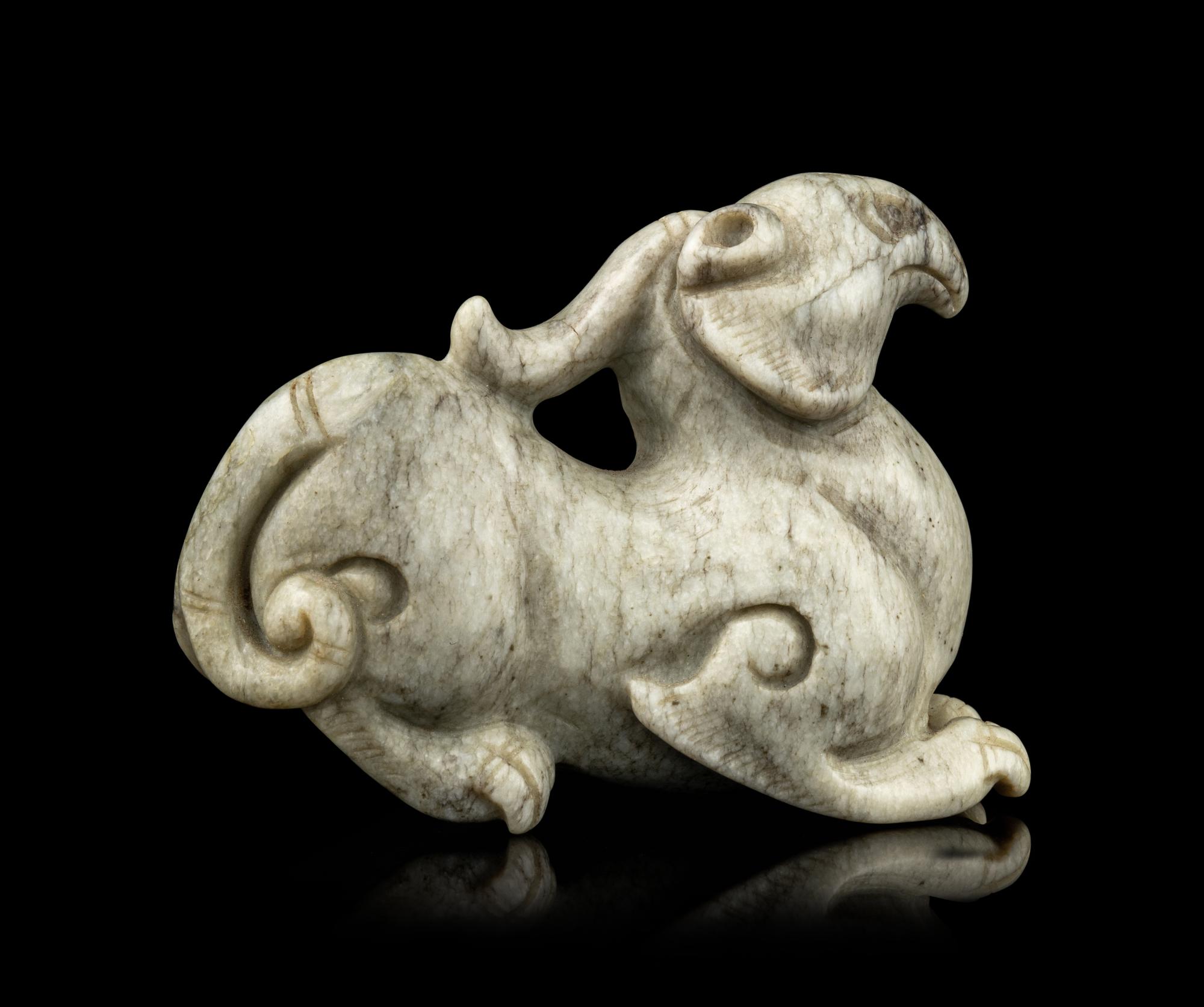 A Chinese Chicken Bone Jade Mythical Beast