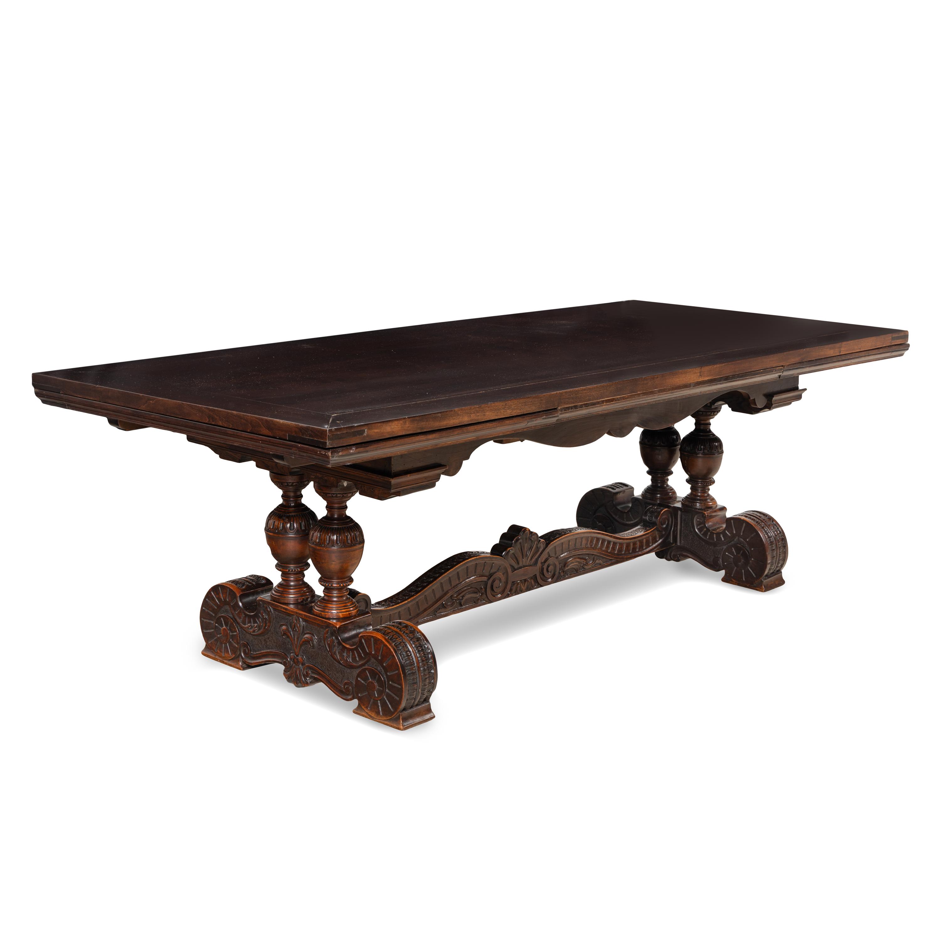 An Italian Renaissance Style Walnut Dining Table