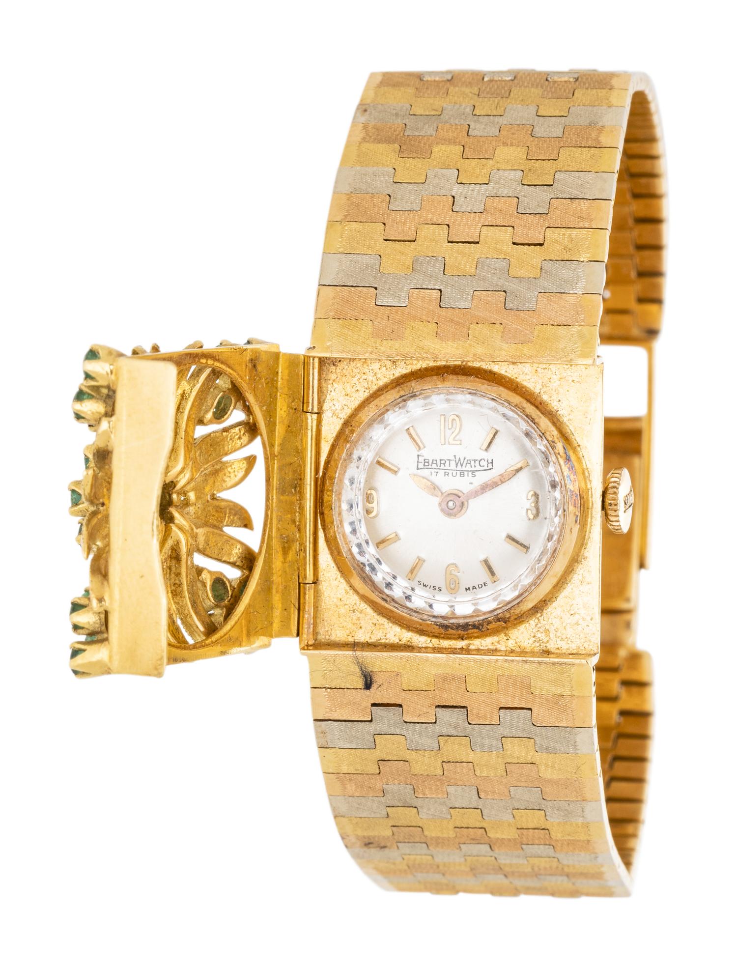TRICOLOR GOLD AND EMERALD SURPRISE WATCH