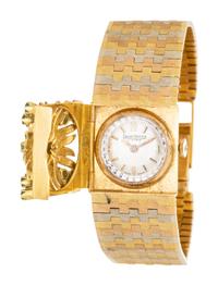TRICOLOR GOLD AND EMERALD SURPRISE WATCH