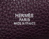 An Hermes Raisin Togo 22cm So-Kelly Handbag, 9" x 11" x 4.5".