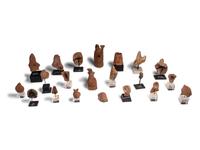 Twenty-One Egyptian Terracotta Heads and Figures