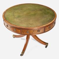A Regency mahogany and satinwood drum center table circa 1810