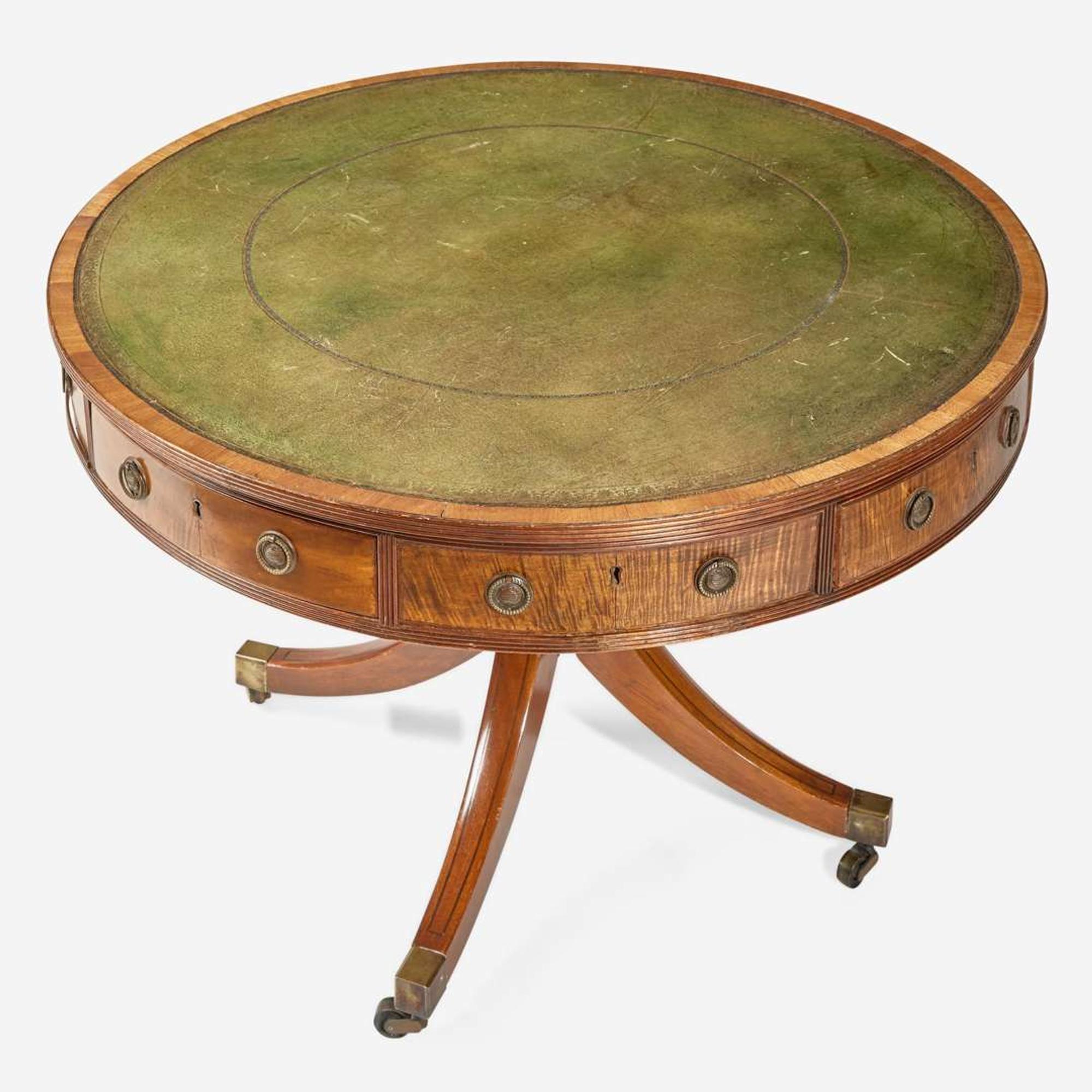A Regency mahogany and satinwood drum center table circa 1810