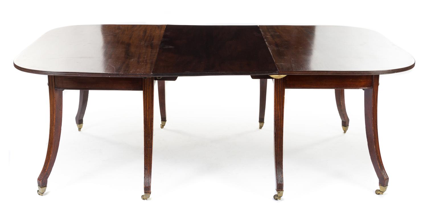 A Regency Mahogany Dining Table Height 28 x width 44 x depth 57 3/4 inches (closed). — CIRCA 1815