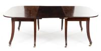 A Regency Mahogany Dining Table Height 28 x width 44 x depth 57 3/4 inches (closed). — CIRCA 1815