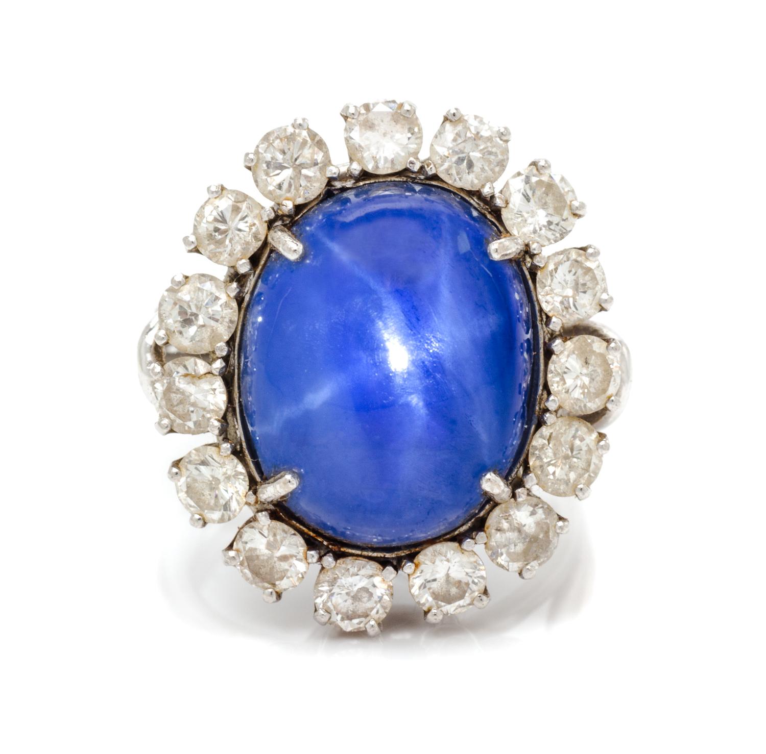 A Platinum, Star Sapphire and Diamond Ring, 11.80 dwts.