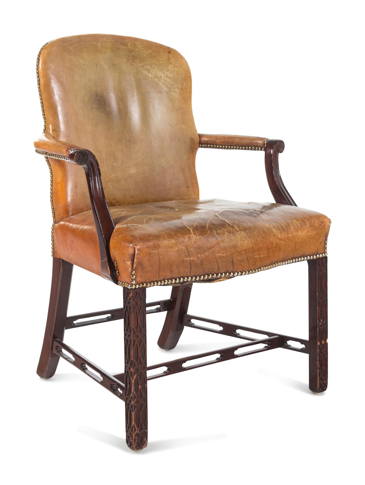 A Pair of George III Style Leather-Upholstered Mahogany Armchairs