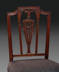 A Set of Eight Federal Carved Mahogany Dining Chairs