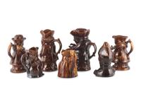 Seven Rockingham Glaze Toby Jugs
