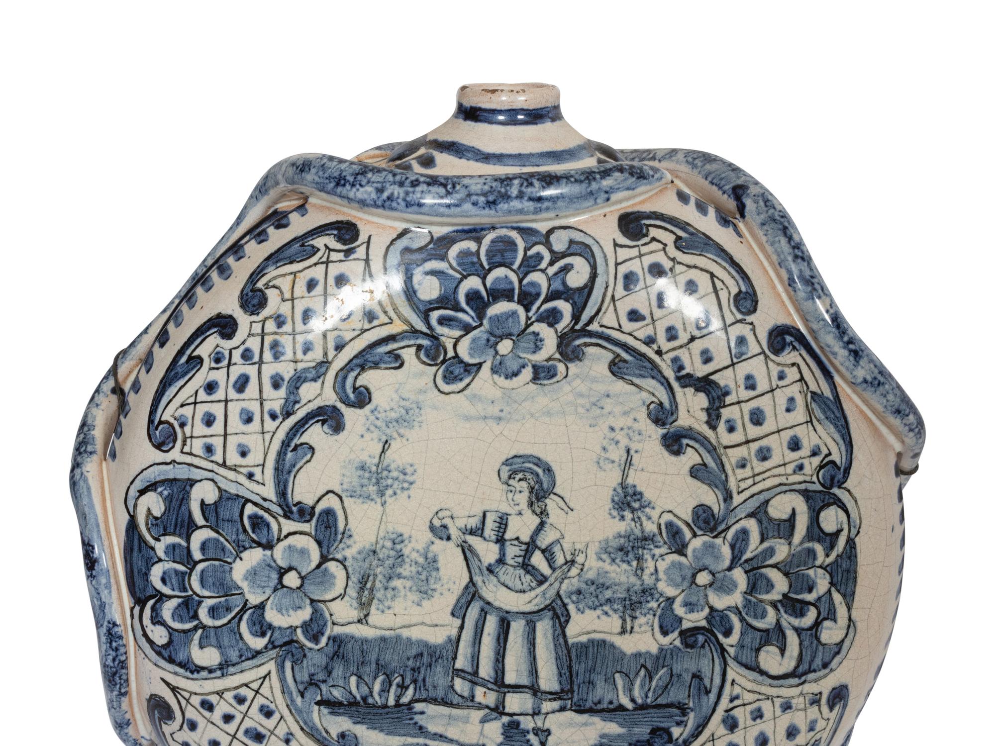 A Group of Twelve Delft and Other Earthenware Articles