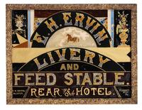A Reverse Painted and Foil Decorated E. H. Ervin Livery and Feedstable Shop Sign