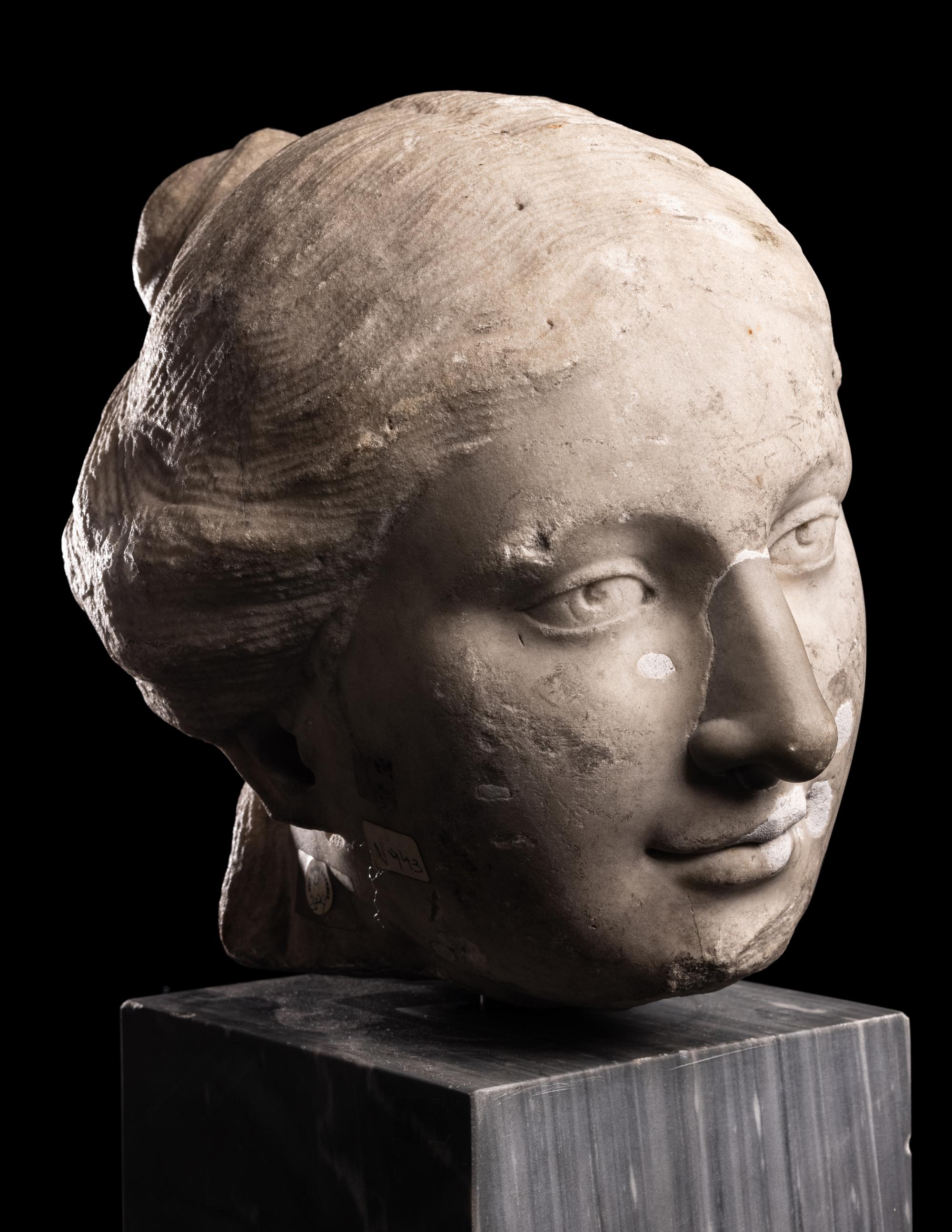A Roman Marble Portrait Head of a Woman