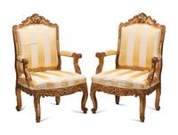 A Pair of Régence Style Giltwood Fauteuils