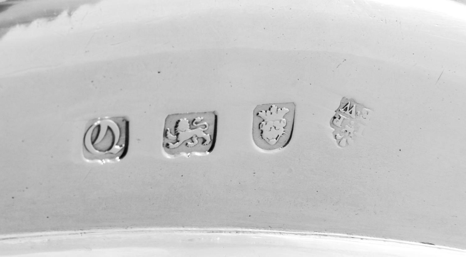 A Pair of George III Silver Meat Platters