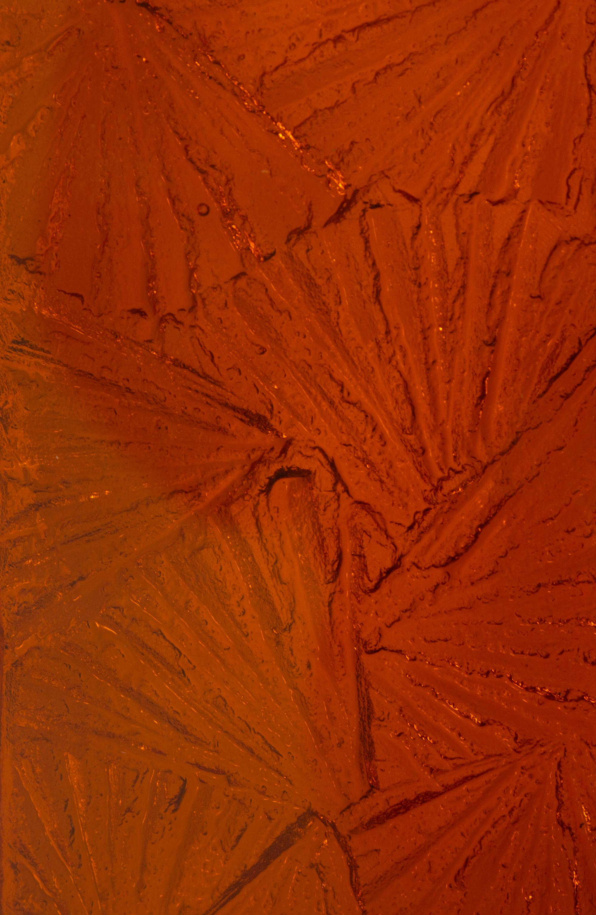 A Pair of Molded Amber Glass Wall Sconces