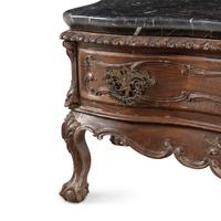 An Italian Carved Walnut and Marble Top Low Console