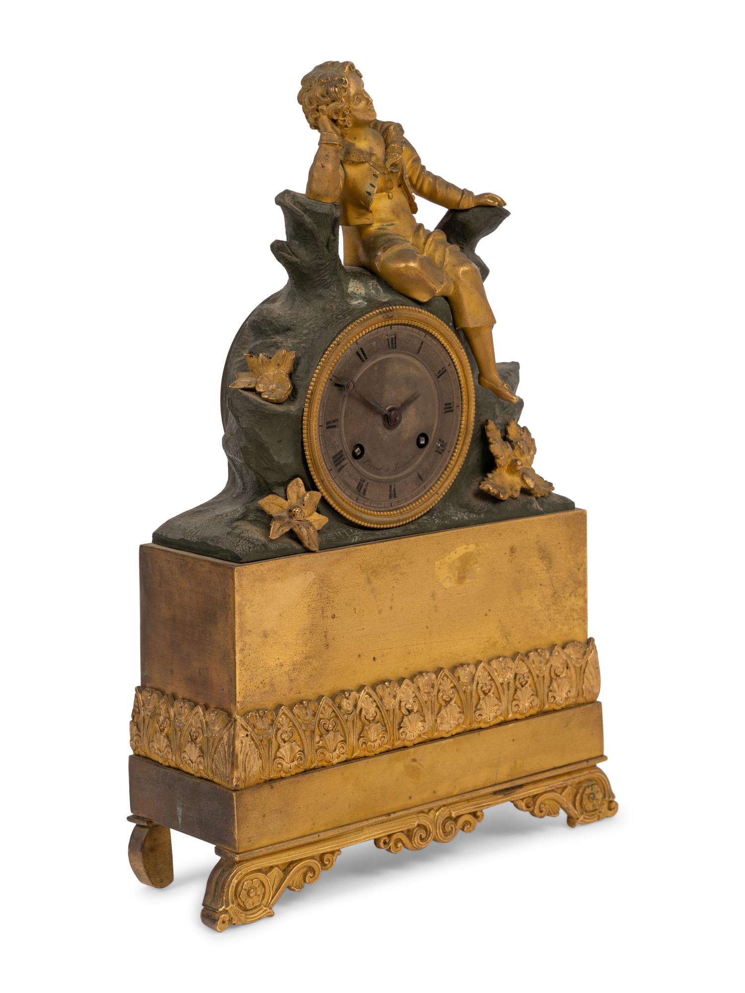 A Charles X Gilt and Patinated Bronze Figural Mantel Clock